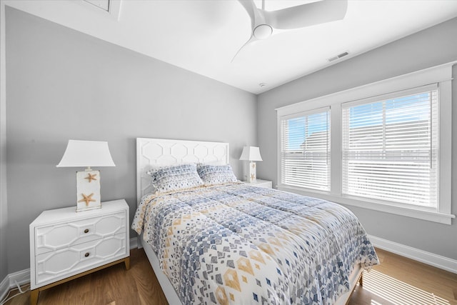 283 85th St, Stone Harbor, NJ 08247 - bedroom featuring baseboards, dark wood-type flooring, and ceiling fan