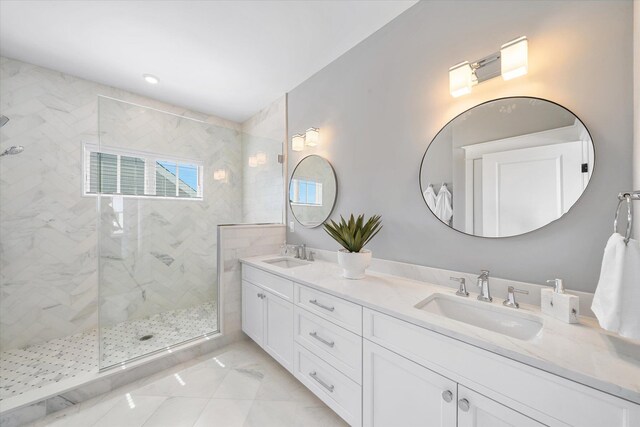 283 85th St, Stone Harbor, NJ 08247 - bathroom featuring a marble finish shower and double vanity