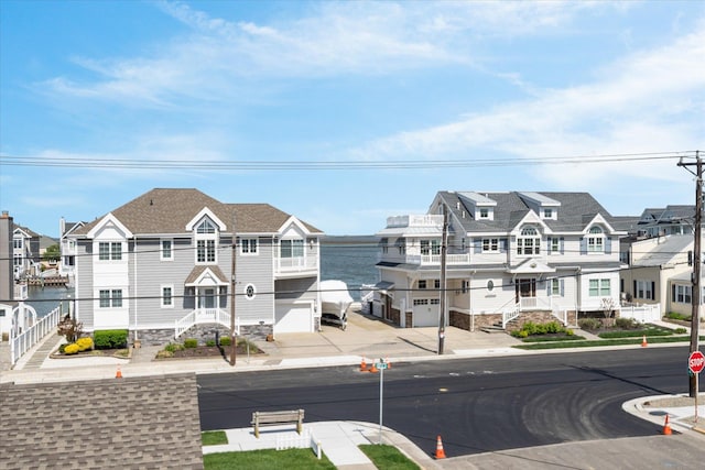 283 85th St, Stone Harbor, NJ 08247 - view of asphalt road with sidewalks, curbs, a residential view, and traffic signs