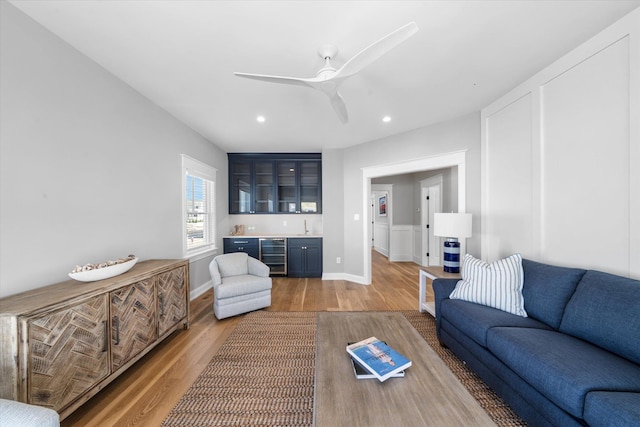 283 85th St, Stone Harbor, NJ 08247 - living room with wine cooler, wet bar, light wood-style floors, a ceiling fan, and recessed lighting