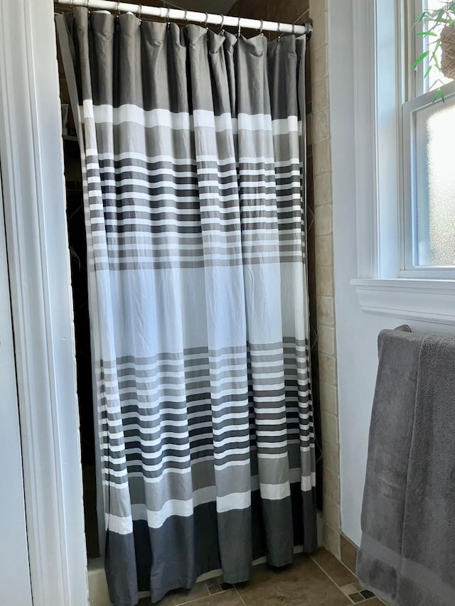 25 Shore Rd, Somers Point, NJ 08244 - full bathroom featuring plenty of natural light and curtained shower