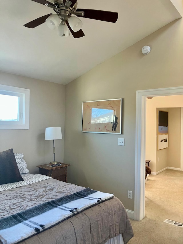 25 Shore Rd, Somers Point, NJ 08244 - bedroom with light colored carpet, lofted ceiling, and a ceiling fan