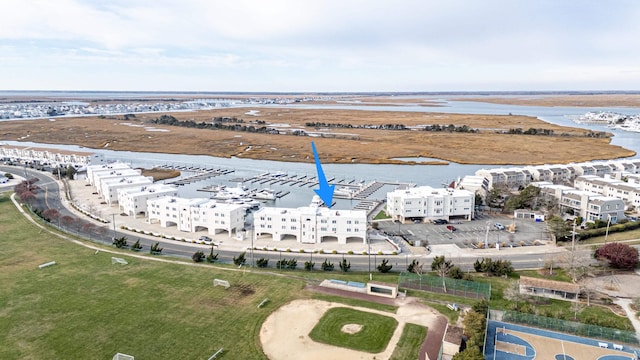 drone / aerial view featuring a water view