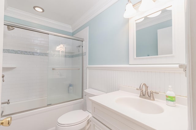 7889 Sunset Dr N, Unit North, Avalon, NJ 08202 - bathroom with a wainscoted wall, crown molding, toilet, vanity, and enclosed tub / shower combo