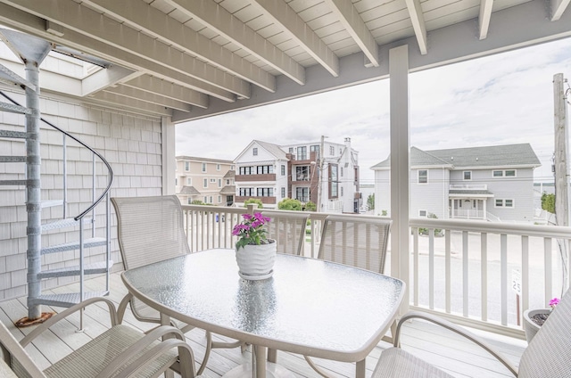 7889 Sunset Dr N, Unit North, Avalon, NJ 08202 - balcony with a residential view and outdoor dining space