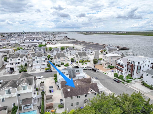 7889 Sunset Dr N, Unit North, Avalon, NJ 08202 - aerial perspective of suburban area with a nearby body of water