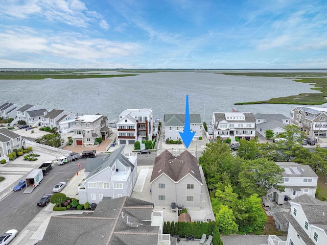 7889 Sunset Dr N, Unit North, Avalon, NJ 08202 - aerial view of residential area with a large body of water