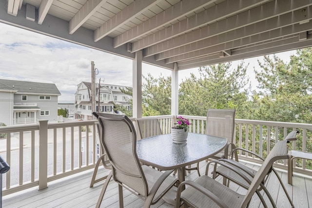 7889 Sunset Dr N, Unit North, Avalon, NJ 08202 - wooden deck featuring a residential view
