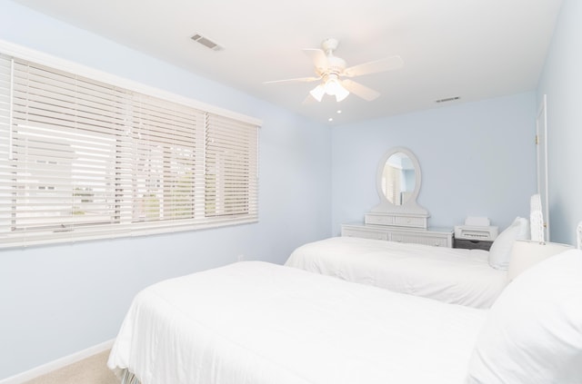 7889 Sunset Dr N, Unit North, Avalon, NJ 08202 - carpeted bedroom with baseboards and a ceiling fan