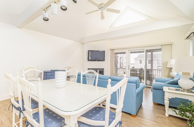 7889 Sunset Dr N, Unit North, Avalon, NJ 08202 - dining space featuring light wood finished floors, ceiling fan, and lofted ceiling