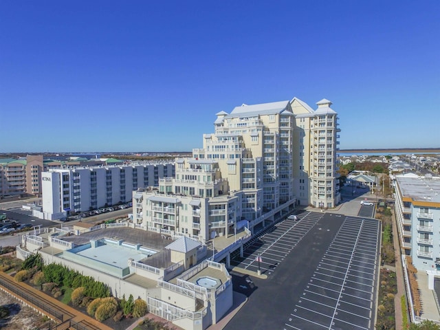 birds eye view of property featuring a city view