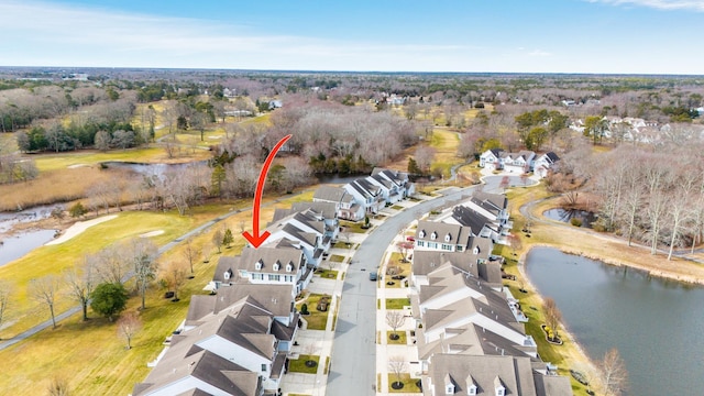 aerial view with a water view and a residential view