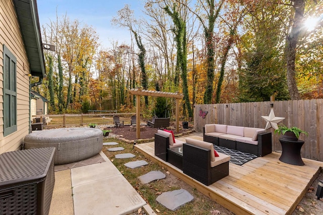 view of patio featuring outdoor lounge area and a wooden deck