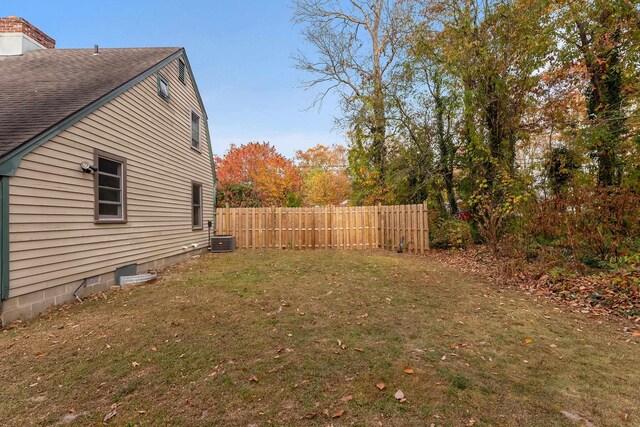 view of yard featuring central AC