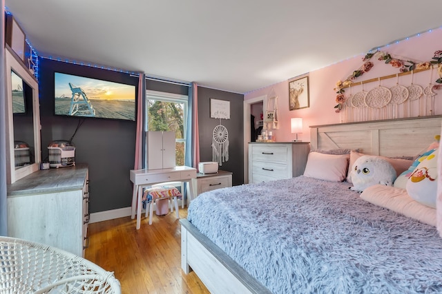 bedroom featuring light wood-type flooring