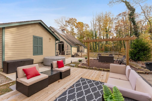 wooden deck featuring outdoor lounge area