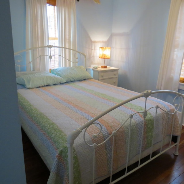 bedroom featuring wood finished floors