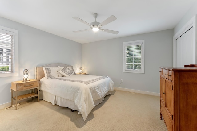 108 27th St, Avalon, NJ 08202 - bedroom with baseboards, light carpet, and ceiling fan