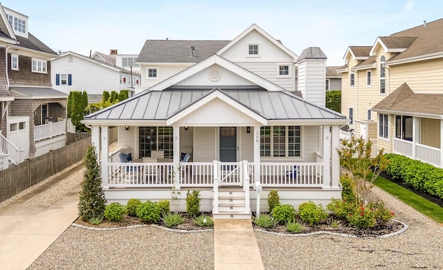 108 27th St, Avalon, NJ 08202 - view of front of property with a standing seam roof, covered porch, and metal roof