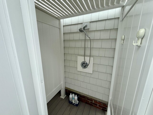 bathroom with wood finished floors