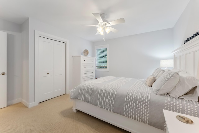 108 27th St, Avalon, NJ 08202 - bedroom featuring light colored carpet, a closet, a ceiling fan, and baseboards