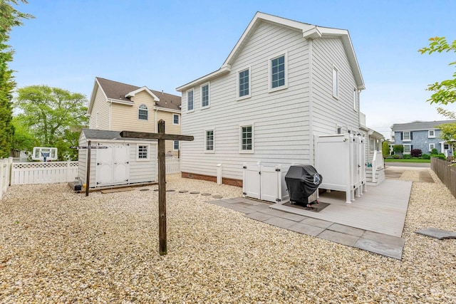 108 27th St, Avalon, NJ 08202 - rear view of property featuring a fenced backyard and a patio