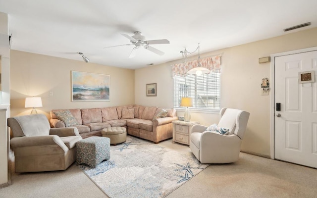 309 E Surf Ave Unit 12, North Wildwood, NJ 08260 - living area featuring a ceiling fan and light colored carpet