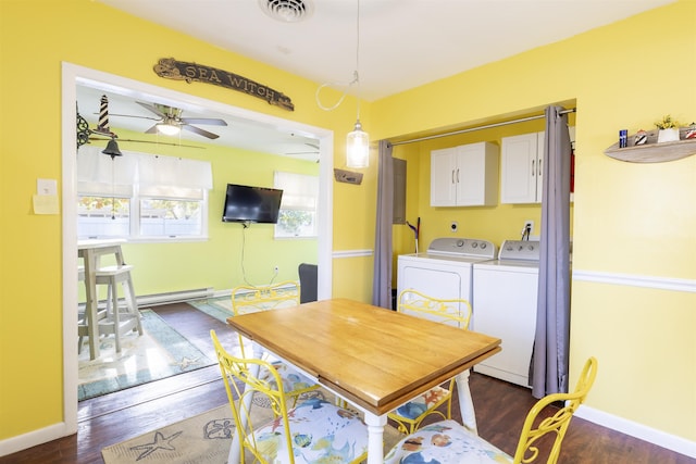 dining room with ceiling fan, dark hardwood / wood-style floors, separate washer and dryer, and a baseboard radiator