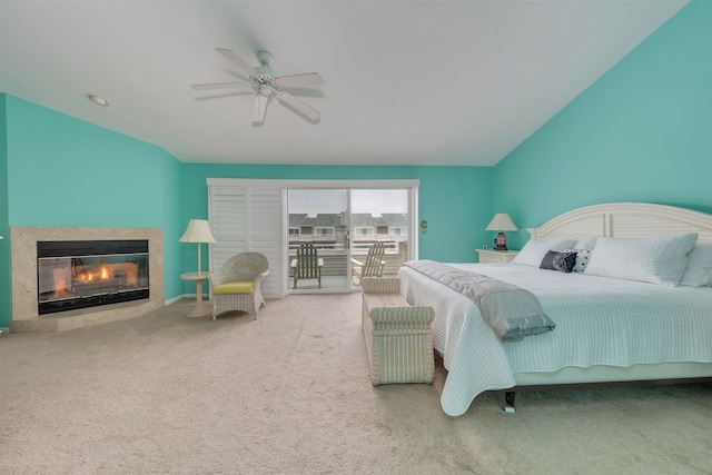 902 Ocean Dr Unit 306, Lower Township, NJ 08204 - bedroom featuring access to exterior, ceiling fan, carpet, and a glass covered fireplace