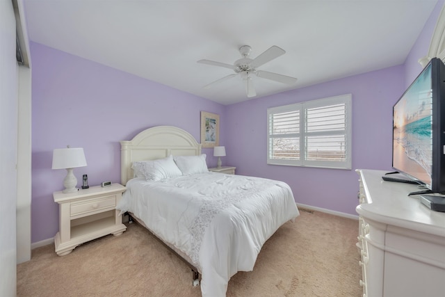 902 Ocean Dr Unit 306, Lower Township, NJ 08204 - bedroom featuring light carpet, ceiling fan, and baseboards