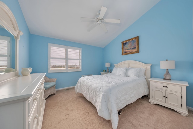 902 Ocean Dr Unit 306, Lower Township, NJ 08204 - bedroom with visible vents, baseboards, a ceiling fan, vaulted ceiling, and light carpet