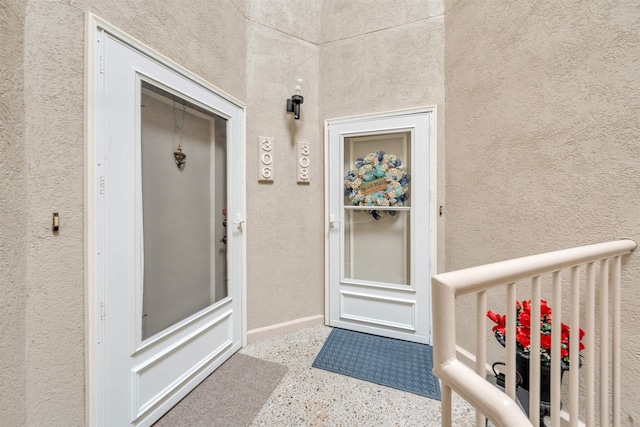 902 Ocean Dr Unit 306, Lower Township, NJ 08204 - view of exterior entry featuring stucco siding