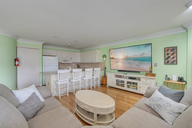 902 Ocean Dr Unit 306, Lower Township, NJ 08204 - living area with crown molding and light wood-type flooring