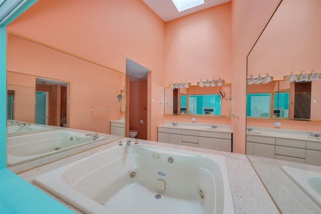 902 Ocean Dr Unit 306, Lower Township, NJ 08204 - full bath featuring a jetted tub, vanity, toilet, and a skylight
