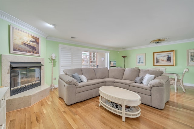 902 Ocean Dr Unit 306, Lower Township, NJ 08204 - living room featuring light wood-style floors, a fireplace, ornamental molding, and visible vents