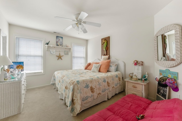 117 W Spicer Ave Unit A, Wildwood, NJ 08260 - bedroom with multiple windows, light carpet, baseboards, and a ceiling fan
