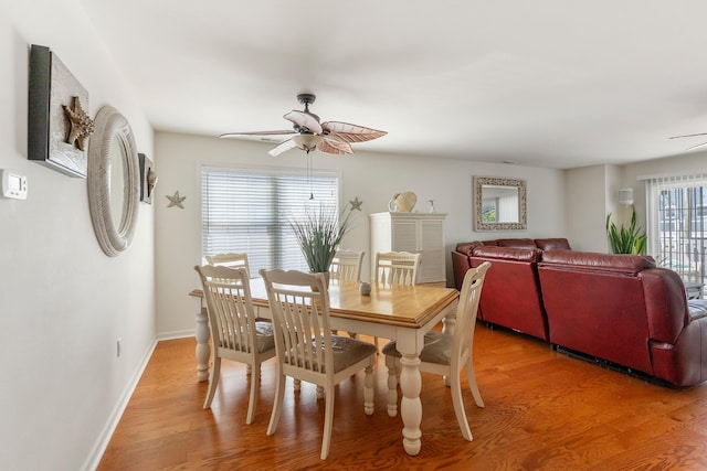 117 W Spicer Ave Unit A, Wildwood, NJ 08260 - dining space featuring ceiling fan, light wood-style flooring, and baseboards