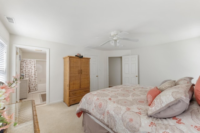 117 W Spicer Ave Unit A, Wildwood, NJ 08260 - bedroom with light carpet, ceiling fan, ensuite bathroom, and baseboards