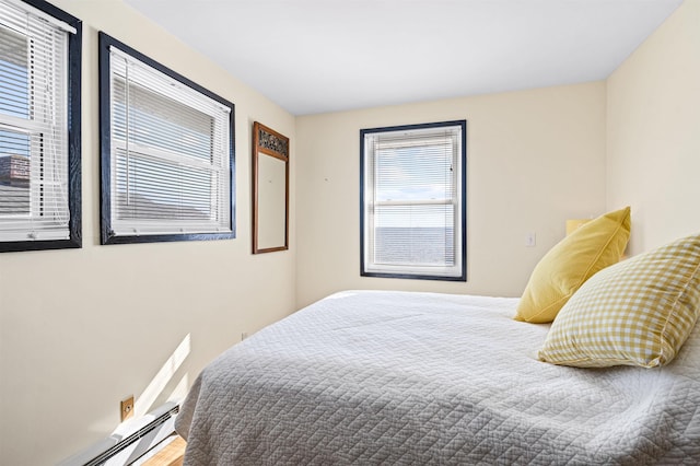 bedroom with a baseboard radiator