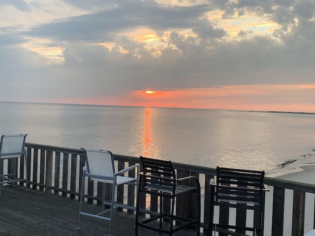 deck at dusk with a water view