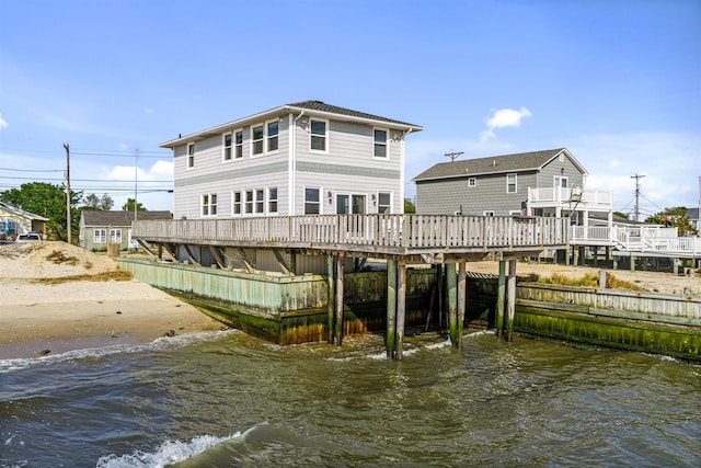 94 Delaware Ave, Fortescue, NJ 08321 - rear view of house with a water view, a carport, and driveway