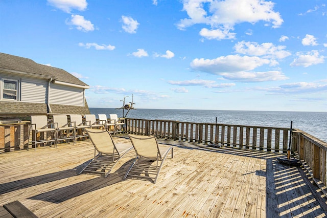 deck featuring a water view