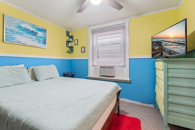 bedroom with cooling unit, ceiling fan, crown molding, and carpet floors