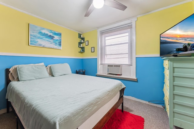 carpeted bedroom featuring ceiling fan, cooling unit, and ornamental molding