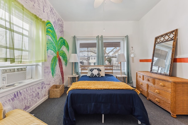 carpeted bedroom featuring ceiling fan and cooling unit