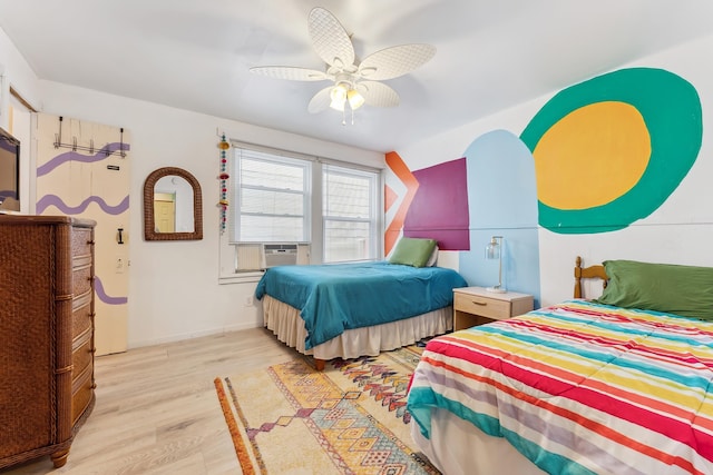 bedroom featuring light wood-type flooring and ceiling fan