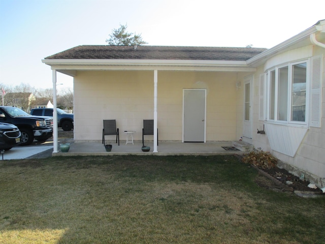 exterior space featuring a patio area and a yard