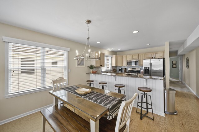 2026 6th Ave Unit S, Avalon, NJ 08202 - dining area featuring light wood-type flooring, a chandelier, baseboards, and recessed lighting