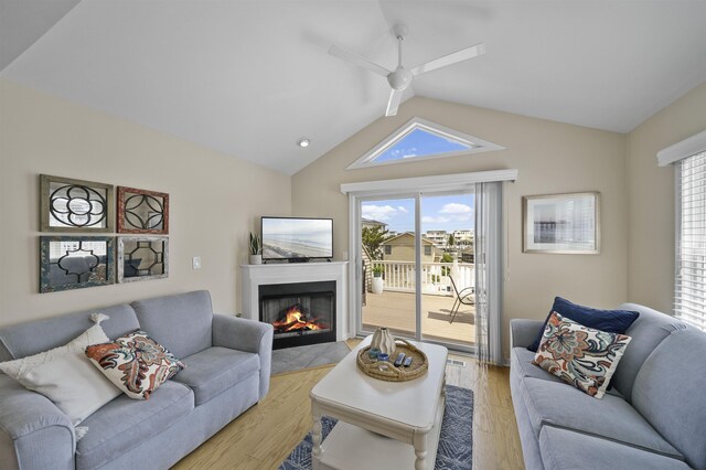 2026 6th Ave Unit S, Avalon, NJ 08202 - living area featuring a ceiling fan, lofted ceiling, light wood-style floors, and a fireplace with flush hearth
