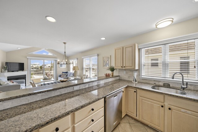 2026 6th Ave Unit S, Avalon, NJ 08202 - kitchen featuring stainless steel dishwasher, light brown cabinetry, a sink, open floor plan, and lofted ceiling